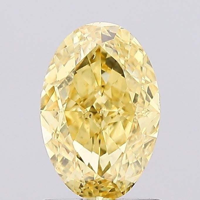 Loose Diamond - OVAL 1.26ct Fancy Vivid Yellow SI1: Loose Diamond - OVAL 1.26ct Fancy Vivid Yellow SI1 Source: This is a real non-mined Diamond that has been grown in a lab Shape: OVAL Carats: 1.26 Color: Fancy Vivid Yellow Certification: IGI Video: