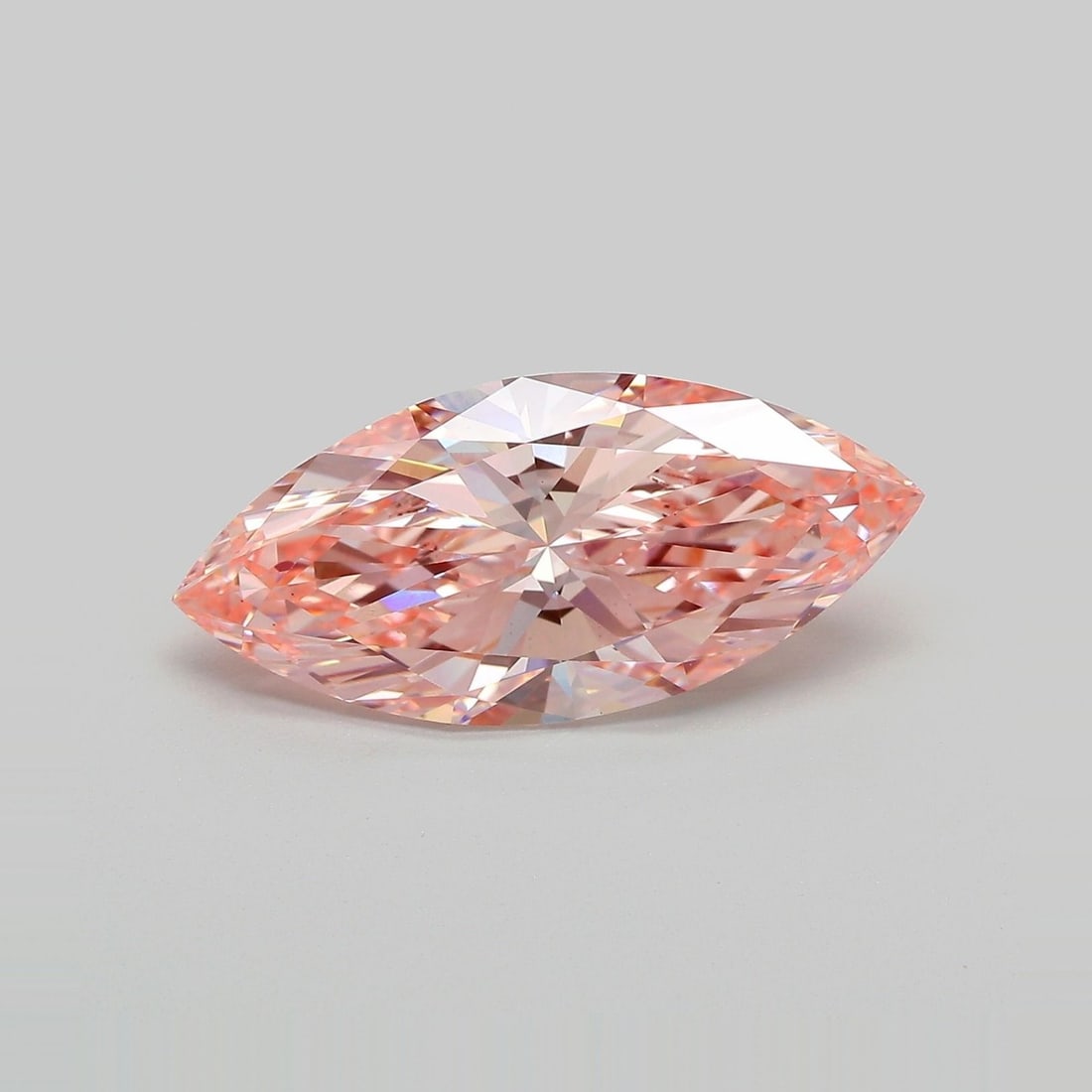Loose Diamond - MARQUISE 4.34ct Fancy Vivid Pink VS1: Loose Diamond - MARQUISE 4.34ct Fancy Vivid Pink VS1 Source: This is a real non-mined Diamond that has been grown in a lab Shape: MARQUISE Carats: 4.34 Color: Fancy Vivid Pink Certification: IGI Video