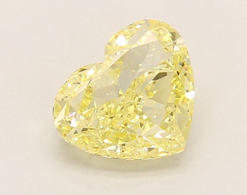 Loose Diamond - HEART 1.7ct Fancy Intense Yellow VVS2: Loose Diamond - HEART 1.7ct Fancy Intense Yellow VVS2 Source: This is a real non-mined Diamond that has been grown in a lab Shape: HEART Carats: 1.7 Color: Fancy Intense Yellow Certification: IGI Vide