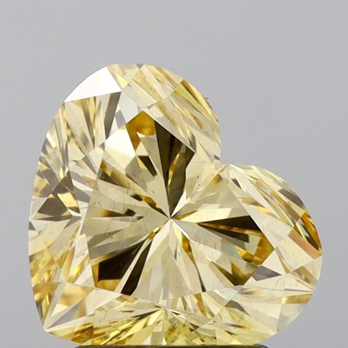 Loose Diamond - HEART 2.09ct Fancy Light Yellow VS2: Loose Diamond - HEART 2.09ct Fancy Light Yellow VS2 Source: This is a real non-mined Diamond that has been grown in a lab Shape: HEART Carats: 2.09 Color: Fancy Light Yellow Certification: IGI Video: