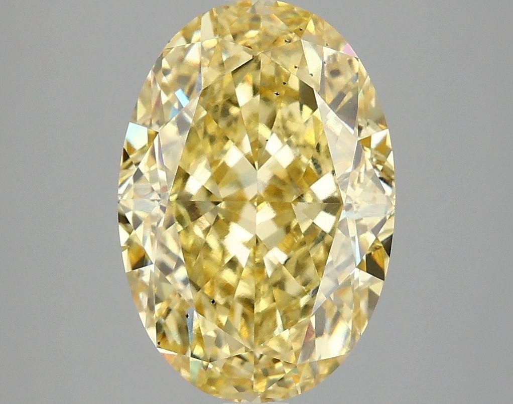 Loose Diamond - OVAL 4.1ct Fancy Vivid Yellow VS2: Loose Diamond - OVAL 4.1ct Fancy Vivid Yellow VS2 Source: This is a real non-mined Diamond that has been grown in a lab Shape: OVAL Carats: 4.1 Color: Fancy Vivid Yellow Certification: IGI Video: