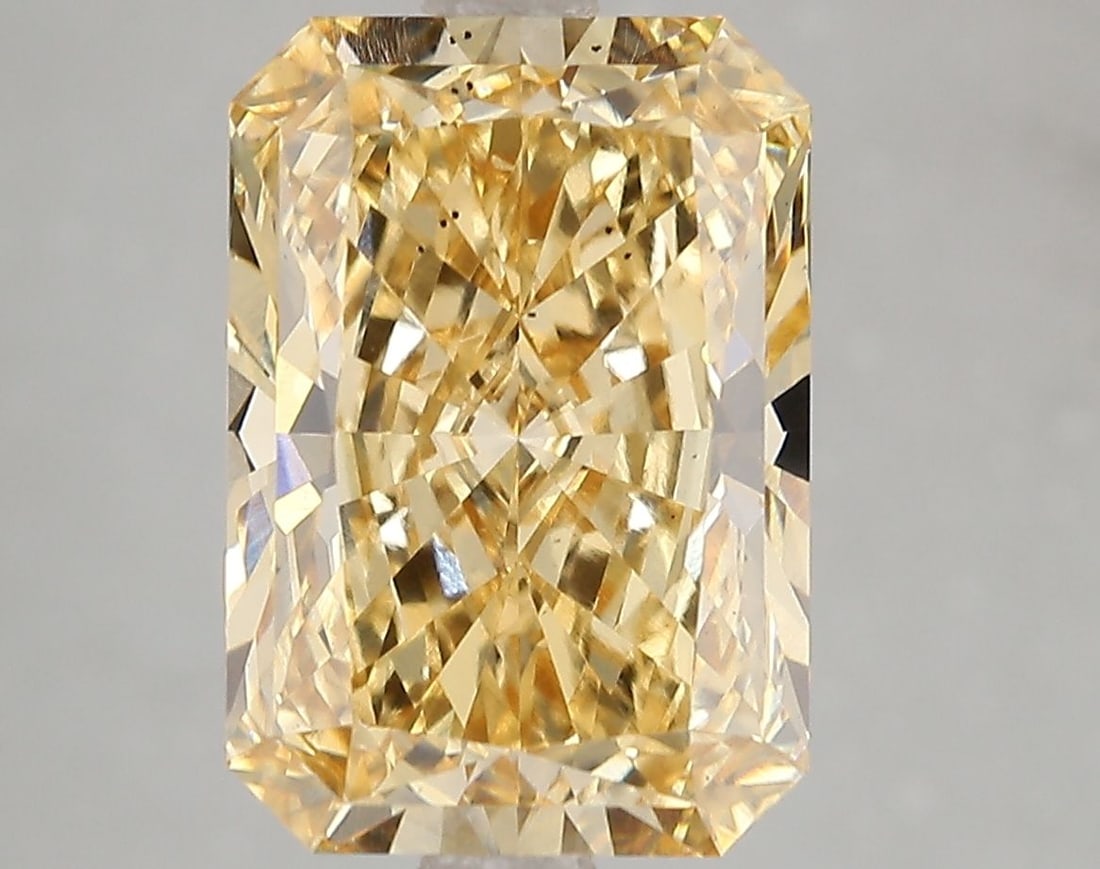 Loose Diamond - RADIANT 5.05ct Fancy Vivid Yellow SI1: Loose Diamond - RADIANT 5.05ct Fancy Vivid Yellow SI1 Source: This is a real non-mined Diamond that has been grown in a lab Shape: RADIANT Carats: 5.05 Color: Fancy Vivid Yellow Certification: IGI Vid