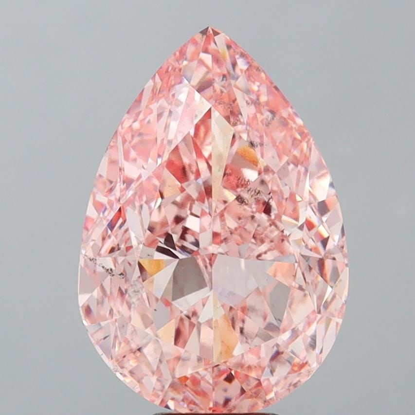 Loose Diamond - PEAR 10.1ct Fancy Vivid Pink SI1: Loose Diamond - PEAR 10.1ct Fancy Vivid Pink SI1 Source: This is a real non-mined Diamond that has been grown in a lab Shape: PEAR Carats: 10.1 Color: Fancy Vivid Pink Certification: IGI Video: