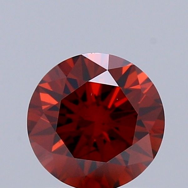 Loose Diamond - ROUND 0.65ct Fancy Deep Orange SI2: Loose Diamond - ROUND 0.65ct Fancy Deep Orange SI2 Source: This is a real non-mined Diamond that has been grown in a lab Shape: ROUND Carats: 0.65 Color: Fancy Deep Orange Certification: IGI Video: