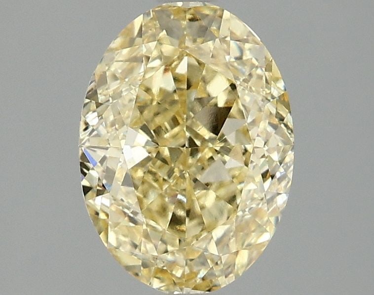 Loose Diamond - OVAL 1.96ct Fancy Vivid Yellow VS1: Loose Diamond - OVAL 1.96ct Fancy Vivid Yellow VS1 Source: This is a real non-mined Diamond that has been grown in a lab Shape: OVAL Carats: 1.96 Color: Fancy Vivid Yellow Certification: IGI Video: