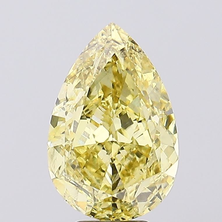 Loose Diamond - PEAR 7.16ct Fancy Vivid Yellow SI1: Loose Diamond - PEAR 7.16ct Fancy Vivid Yellow SI1 Source: This is a real non-mined Diamond that has been grown in a lab Shape: PEAR Carats: 7.16 Color: Fancy Vivid Yellow Certification: IGI Video: