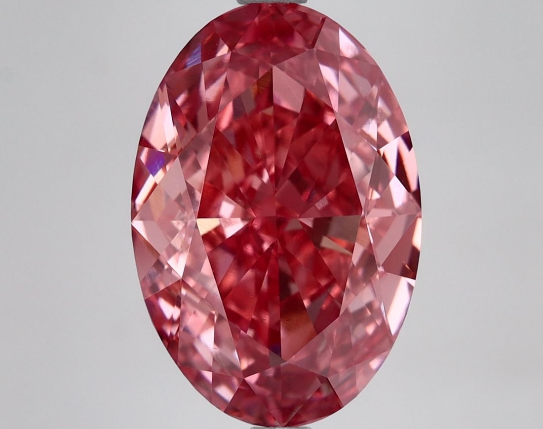 Loose Diamond - OVAL 7.01ct Fancy Vivid Pink VS1: Loose Diamond - OVAL 7.01ct Fancy Vivid Pink VS1 Source: This is a real non-mined Diamond that has been grown in a lab Shape: OVAL Carats: 7.01 Color: Fancy Vivid Pink Certification: IGI Video: