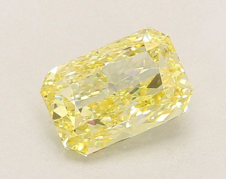 Loose Diamond - RADIANT 2.03ct Fancy Yellow VVS2: Loose Diamond - RADIANT 2.03ct Fancy Yellow VVS2 Source: This is a real non-mined Diamond that has been grown in a lab Shape: RADIANT Carats: 2.03 Color: Fancy Yellow Certification: IGI Video: