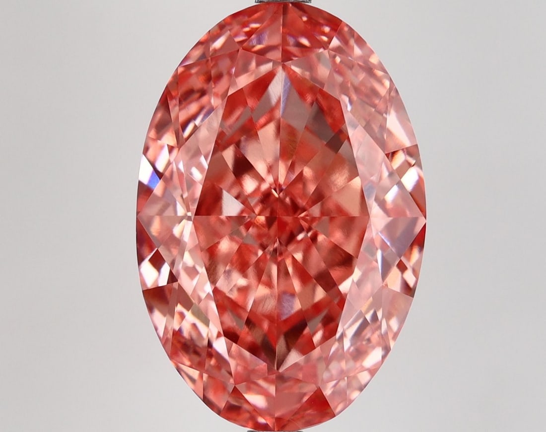 Loose Diamond - OVAL 9.64ct Fancy Vivid Pink VVS2: Loose Diamond - OVAL 9.64ct Fancy Vivid Pink VVS2 Source: This is a real non-mined Diamond that has been grown in a lab Shape: OVAL Carats: 9.64 Color: Fancy Vivid Pink Certification: IGI Video: