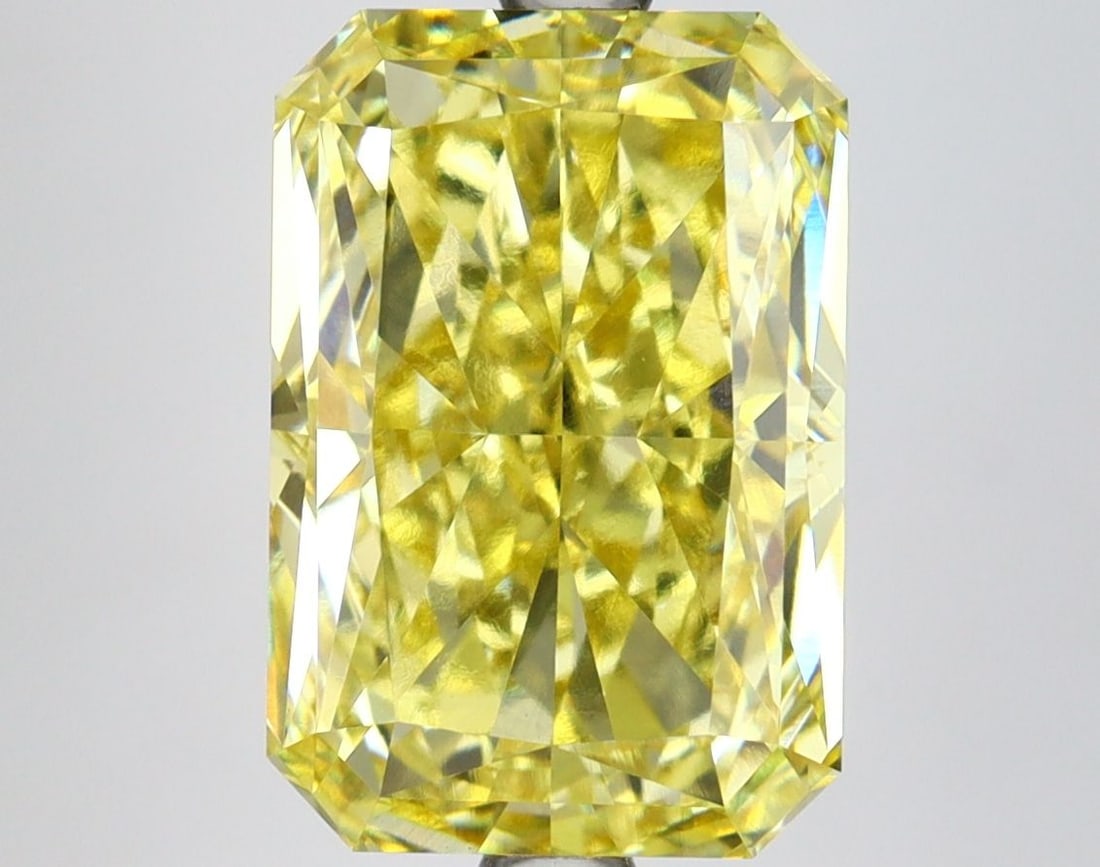 Loose Diamond - RADIANT 5.2ct Fancy Vivid Yellow VS1: Loose Diamond - RADIANT 5.2ct Fancy Vivid Yellow VS1 Source: This is a real non-mined Diamond that has been grown in a lab Shape: RADIANT Carats: 5.2 Color: Fancy Vivid Yellow Certification: IGI Video