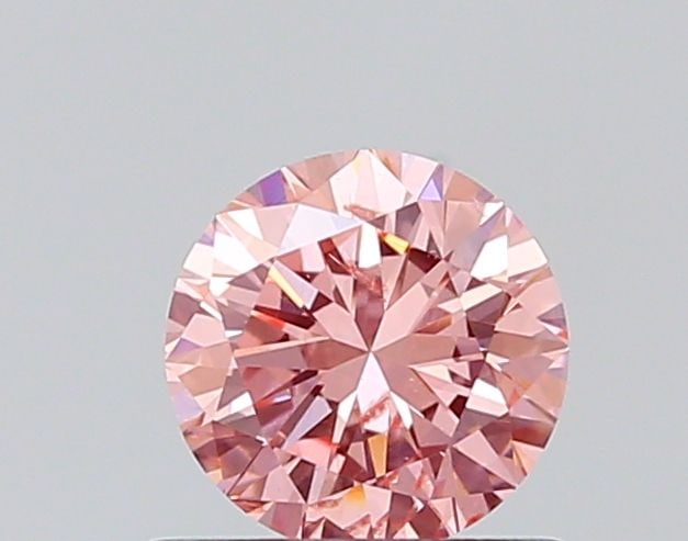 Loose Diamond - ROUND 0.57ct Fancy Vivid Pink SI2: Loose Diamond - ROUND 0.57ct Fancy Vivid Pink SI2 Source: This is a real non-mined Diamond that has been grown in a lab Shape: ROUND Carats: 0.57 Color: Fancy Vivid Pink Certification: NONE The Diamon