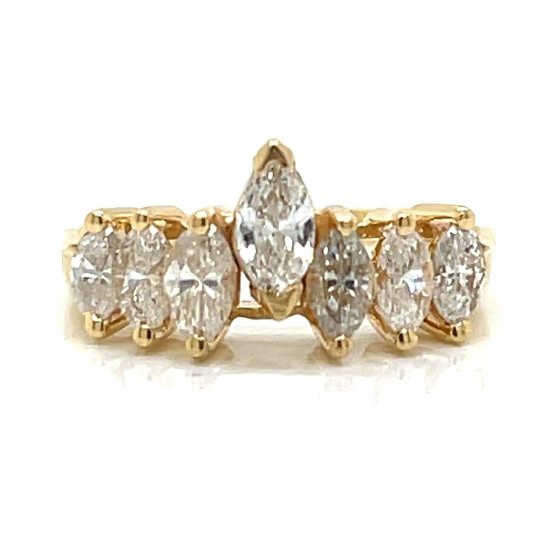 14K Yellow Gold 0.95 Ct Marquise Diamond Ring: 14K Yellow Gold 0.95 Ct Marquise Diamond Ring This exquisite 14K Yellow Gold ring features a stunning arrangement of 7 Marquise Diamonds, totaling approximately 0.95 Ct. The diamonds possess a beautif