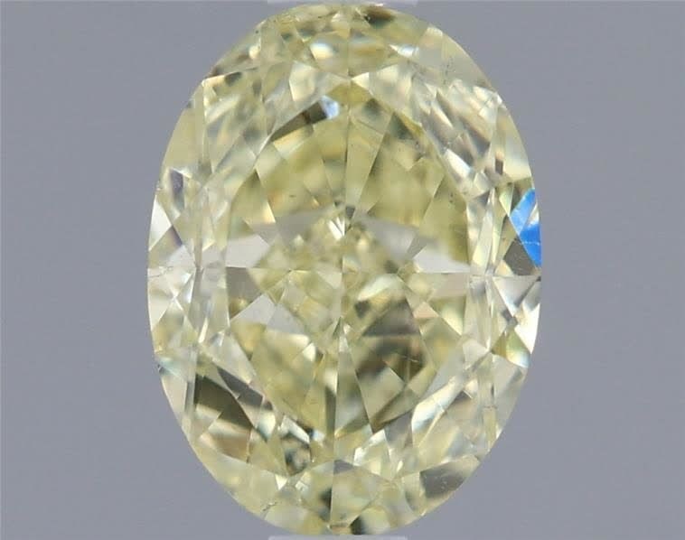 Loose Diamond - OVAL 1.01ct Fancy Light Yellow SI1: Loose Diamond - OVAL 1.01ct Fancy Light Yellow SI1 Source: Natural Shape: OVAL Carats: 1.01 Color: Fancy Light Yellow Certification: GIA Video: