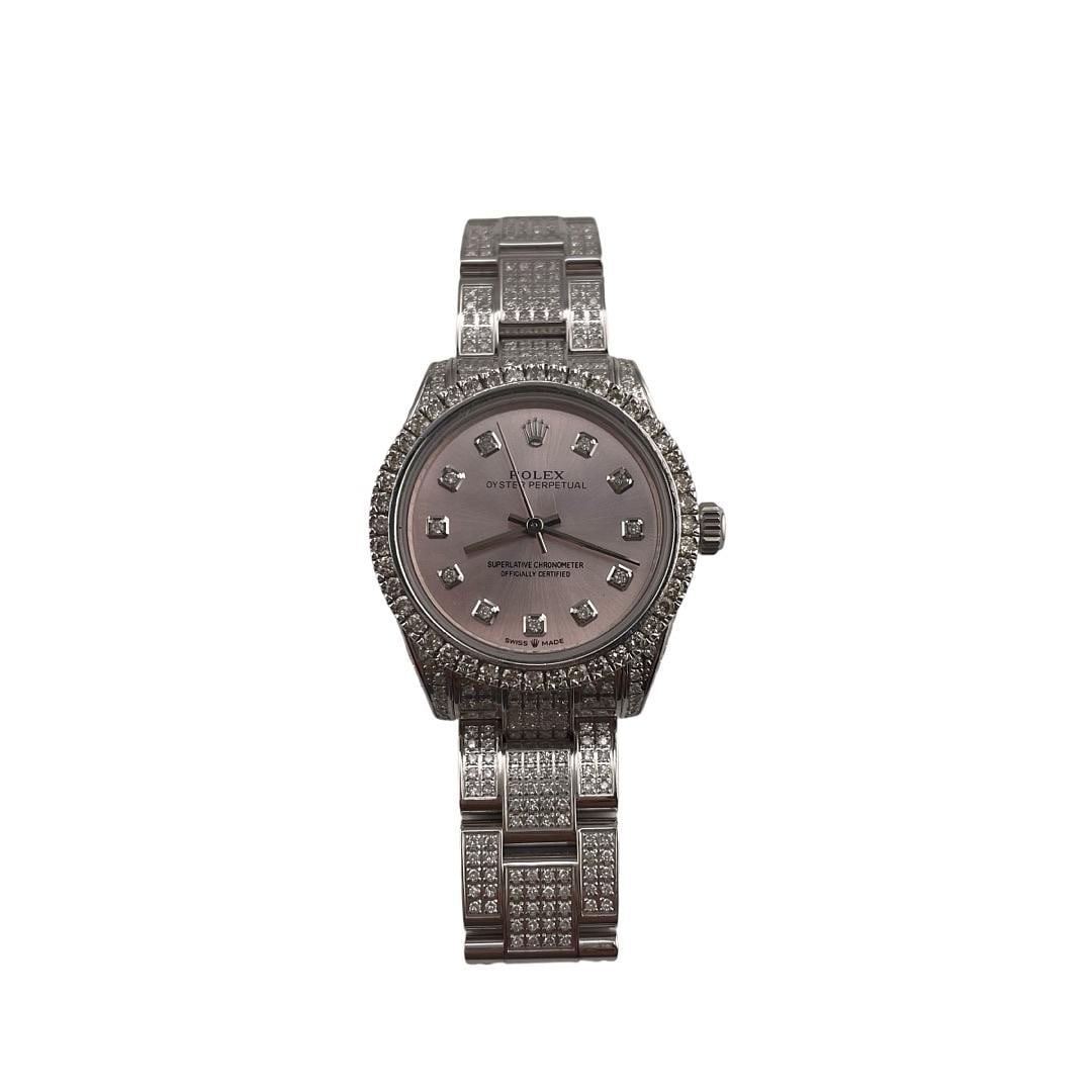Ladies Rolex 177200 Aftermarket Silver Dial Diamond Bezel Oyster Bracelet Watch: Ladies Rolex 177200 Aftermarket Silver Dial Diamond Bezel Oyster Bracelet Watch This Rolex Oyster Perpetual watch features an aftermarket silver dial and a diamond bezel, paired with the classic Oyste