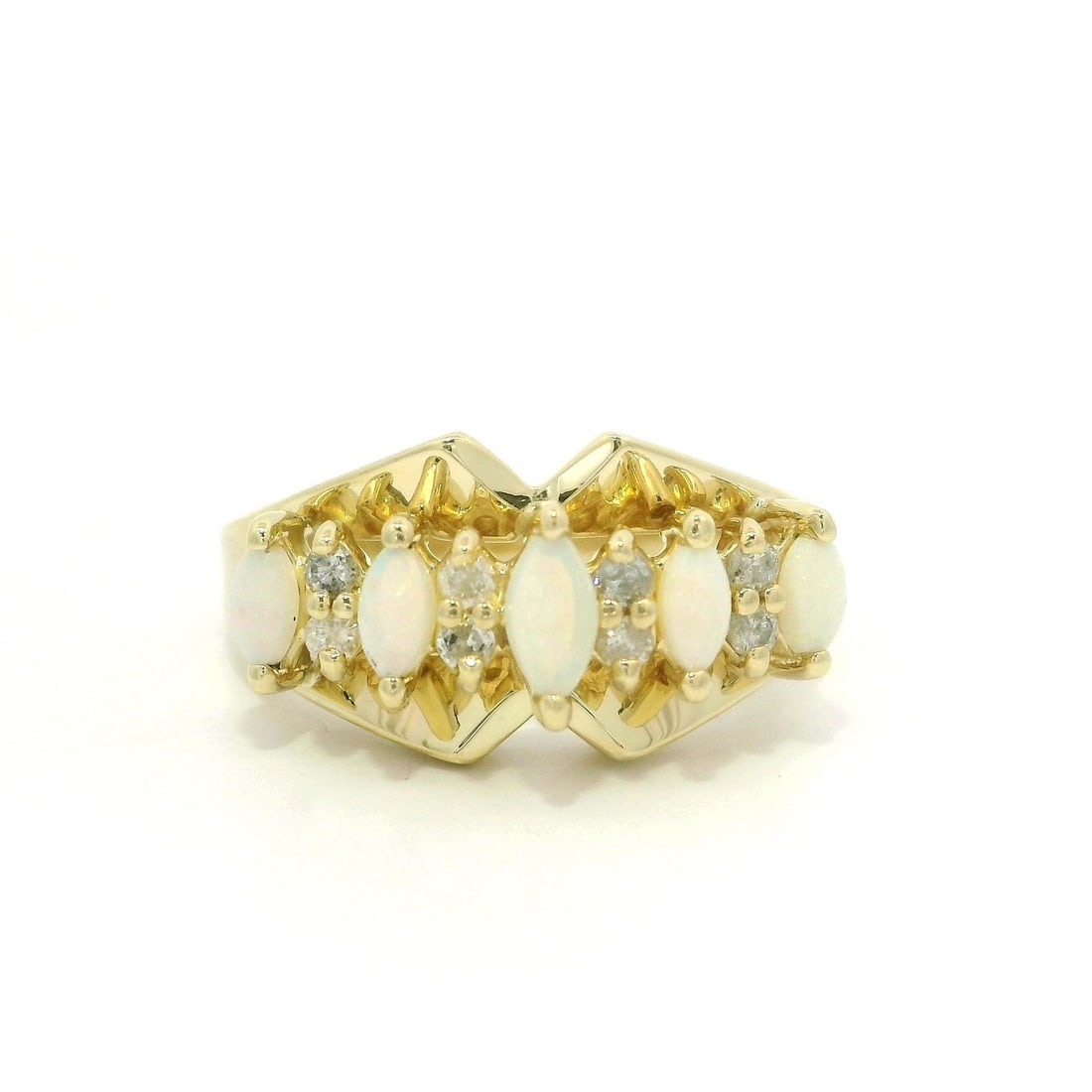 14k Yellow Gold Marquise Opal Diamond Pyramid Band Ring: 14k Yellow Gold Marquise Opal Diamond Pyramid Band Ring This exquisite band ring features a stunning marquise opal at its center, showcasing a mesmerizing white base with vibrant green and orange colo