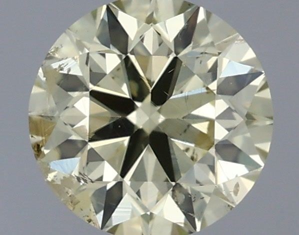 Loose Diamond - ROUND 0.51ct Fancy Light Yellow SI2: Loose Diamond - ROUND 0.51ct Fancy Light Yellow SI2 Source: Natural Shape: ROUND Carats: 0.51 Color: Fancy Light Yellow Certification: IGI Video: