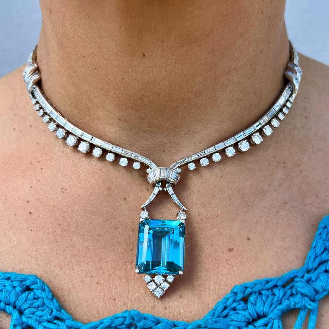 Art Deco Platinum Necklace 35.60 Ct Santa Maria Aquamarine 177 Diamonds: Art Deco Platinum Necklace 35.60 Ct Santa Maria Aquamarine 177 Diamonds This exquisite Art Deco necklace is crafted in platinum and features a stunning 35.60 Ct. Santa Maria Aquamarine at its center,