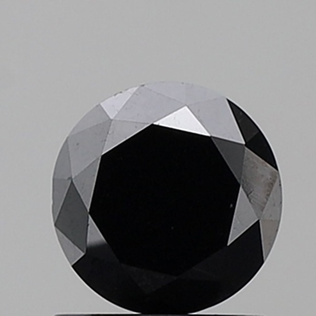 Loose Diamond - ROUND 1.22ct Fancy Black VS1: Loose Diamond - ROUND 1.22ct Fancy Black VS1 Source: Natural Shape: ROUND Carats: 1.22 Color: Fancy Black Certification: NONE Video: