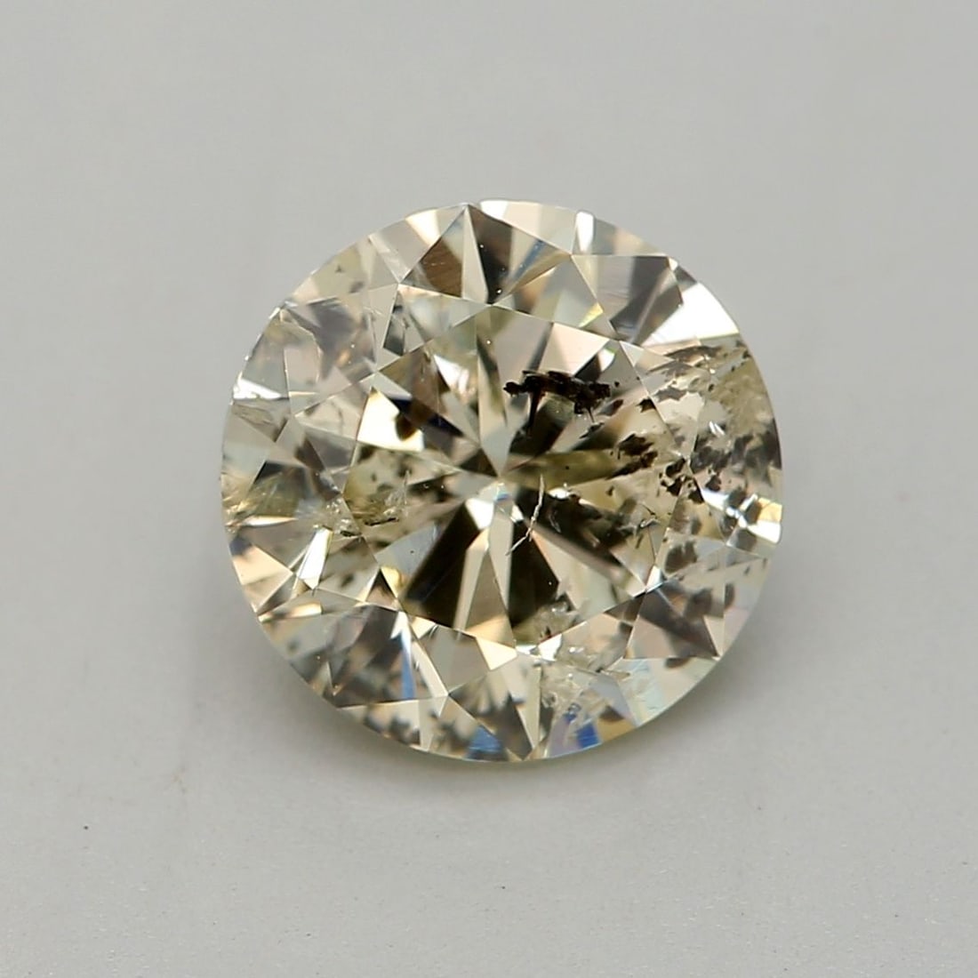 Loose Diamond - ROUND 1.0ct Q-R I2: Loose Diamond - ROUND 1.0ct Q-R I2 Source: Natural Shape: ROUND Carats: 1.0 Color: Q-R Certification: GIA Video: