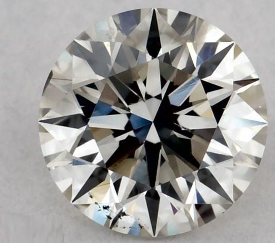 Loose Diamond - ROUND 0.41ct J I1: Loose Diamond - ROUND 0.41ct J I1 Source: Natural Shape: ROUND Carats: 0.41 Color: J Clarity: I1 Certification: GIA The Diamond Depot Guarantee: All items in this auction are guaranteed to be 100% aut