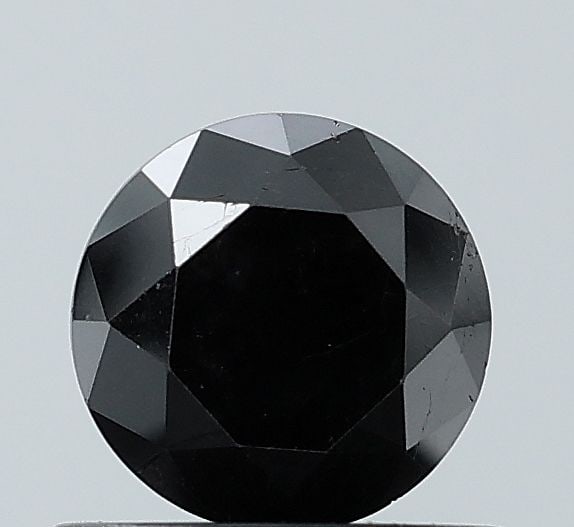 Loose Diamond - ROUND 0.84ct Fancy Black VS1: Loose Diamond - ROUND 0.84ct Fancy Black VS1 Source: Natural Shape: ROUND Carats: 0.84 Color: Fancy Black Certification: NONE Video: