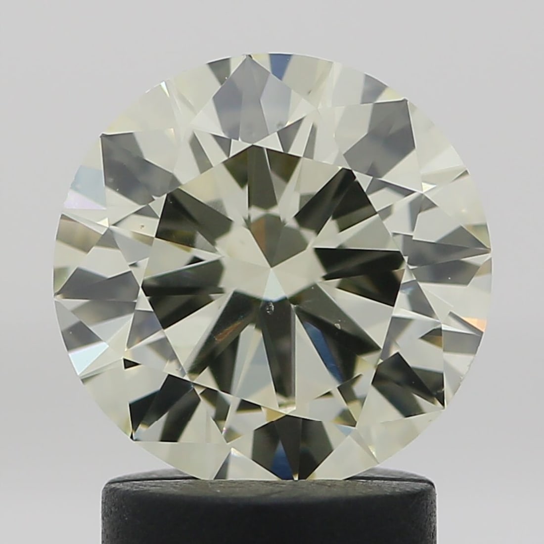 Loose Diamond - ROUND 1.71ct N-O VS2: Loose Diamond - ROUND 1.71ct N-O VS2 Source: Natural Shape: ROUND Carats: 1.71 Color: N-O Certification: HRD Video: