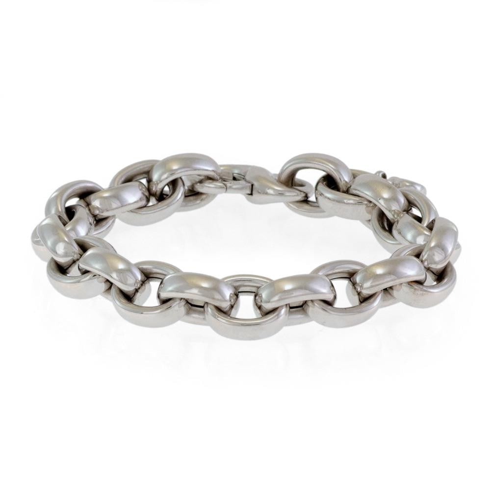 Chopard Les Chaines 18k White Gold Bracelet with Heart Charm: Chopard Les Chaines 18k White Gold Bracelet with Heart Charm This stunning bracelet from Chopard's Les Chaines Collection showcases exquisite craftsmanship in 18k white gold. It features a series of 1