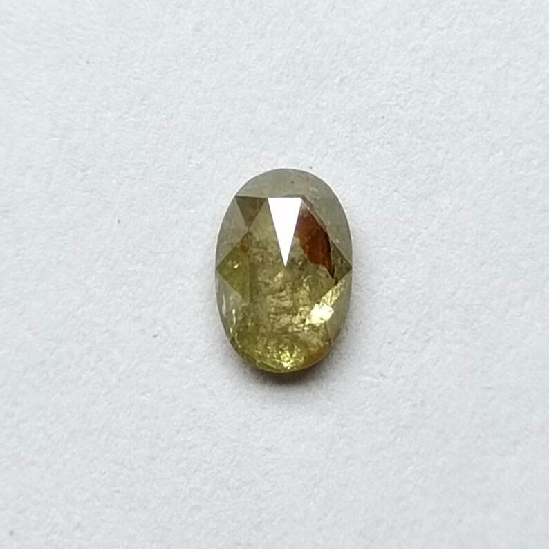 Loose Diamond - OVAL 0.54ct Fancy Salt and Pepper I3: Loose Diamond - OVAL 0.54ct Fancy Salt and Pepper I3 Source: Natural Shape: OVAL Carats: 0.54 Color: Fancy Salt and Pepper Certification: NONE The Diamond Depot Guarantee: All items in this auction ar