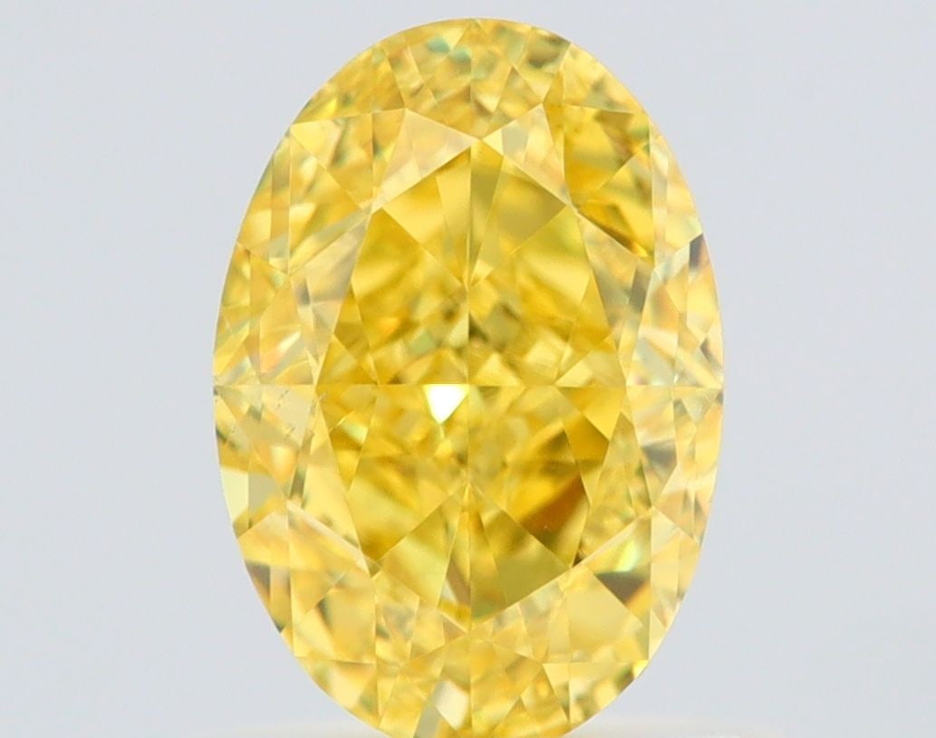 Loose Diamond - OVAL 1.03ct Fancy Vivid Yellow VS2: Loose Diamond - OVAL 1.03ct Fancy Vivid Yellow VS2 Source: Natural Shape: OVAL Carats: 1.03 Color: Fancy Vivid Yellow Certification: GIA Video: