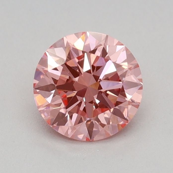 Ideal Loose Diamond - ROUND 0.4ct Fancy Vivid Pink VVS2: Ideal Loose Diamond - ROUND 0.4ct Fancy Vivid Pink VVS2 Source: This is a real non-mined Diamond that has been grown in a lab Shape: ROUND Carats: 0.4 Color: Fancy Vivid Pink Certification: IGI Video: