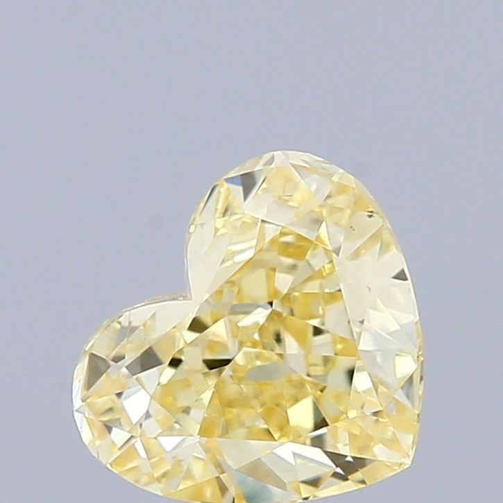 Loose Diamond - HEART 1.02ct Fancy Yellow VS1: Loose Diamond - HEART 1.02ct Fancy Yellow VS1 Source: This is a real non-mined Diamond that has been grown in a lab Shape: HEART Carats: 1.02 Color: Fancy Yellow Certification: IGI Video: