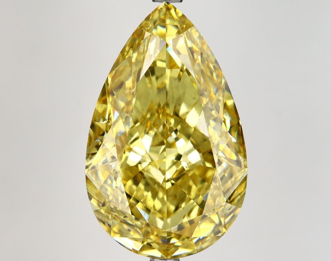 Loose Diamond - PEAR 10.34ct Fancy Vivid Yellow VS2: Loose Diamond - PEAR 10.34ct Fancy Vivid Yellow VS2 Source: This is a real non-mined Diamond that has been grown in a lab Shape: PEAR Carats: 10.34 Color: Fancy Vivid Yellow Certification: IGI Video: