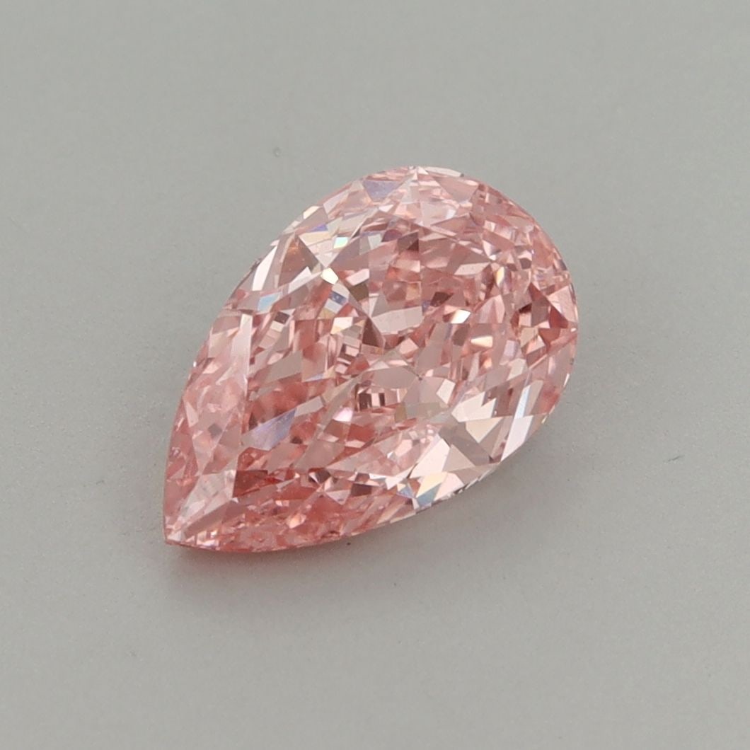 Loose Diamond - PEAR 1.55ct Fancy Vivid Pink VS1: Loose Diamond - PEAR 1.55ct Fancy Vivid Pink VS1 Source: This is a real non-mined Diamond that has been grown in a lab Shape: PEAR Carats: 1.55 Color: Fancy Vivid Pink Certification: IGI The Diamond D