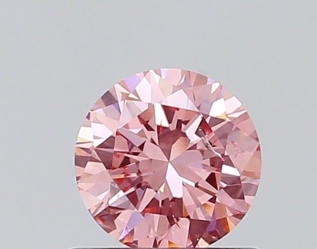 Loose Diamond - ROUND 0.57ct Fancy Vivid Pink I1: Loose Diamond - ROUND 0.57ct Fancy Vivid Pink I1 Source: This is a real non-mined Diamond that has been grown in a lab Shape: ROUND Carats: 0.57 Color: Fancy Vivid Pink Certification: NONE The Diamond