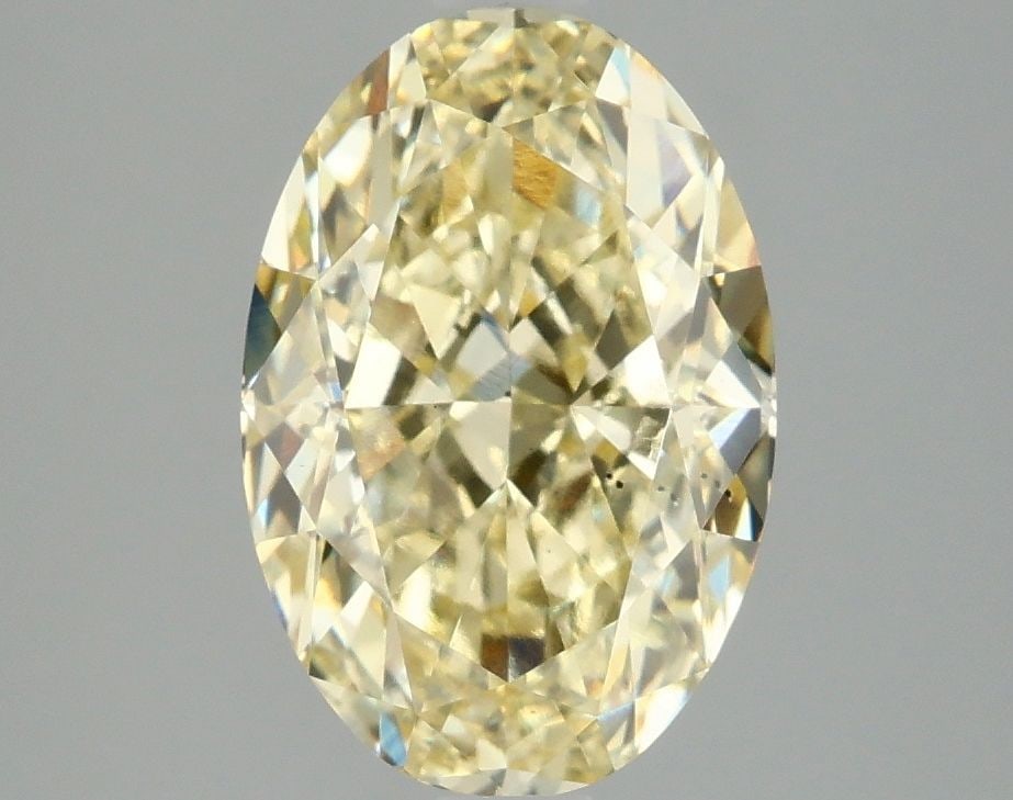 Loose Diamond - OVAL 3.08ct Fancy Intense Yellow VS2: Loose Diamond - OVAL 3.08ct Fancy Intense Yellow VS2 Source: This is a real non-mined Diamond that has been grown in a lab Shape: OVAL Carats: 3.08 Color: Fancy Intense Yellow Certification: IGI Video