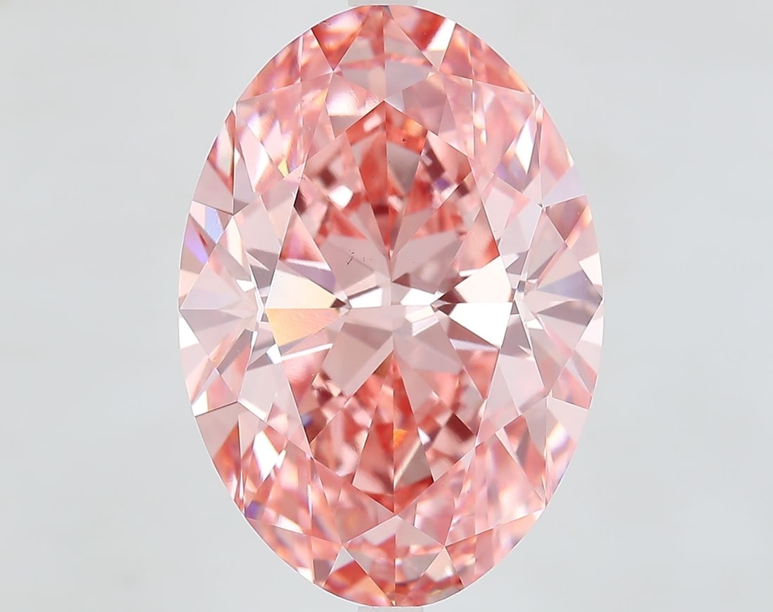 Loose Diamond - OVAL 13.03ct Fancy Vivid Pink VS1: Loose Diamond - OVAL 13.03ct Fancy Vivid Pink VS1 Source: This is a real non-mined Diamond that has been grown in a lab Shape: OVAL Carats: 13.03 Color: Fancy Vivid Pink Certification: IGI Video: