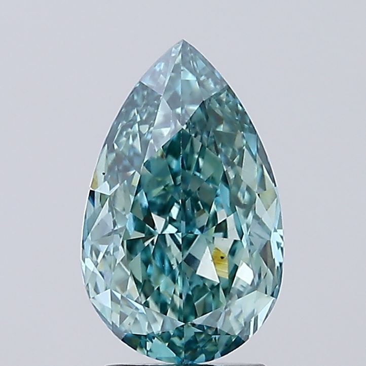 Loose Diamond - PEAR 3.03ct Fancy Vivid Green VS2: Loose Diamond - PEAR 3.03ct Fancy Vivid Green VS2 Source: This is a real non-mined Diamond that has been grown in a lab Shape: PEAR Carats: 3.03 Color: Fancy Vivid Green Certification: IGI Video: