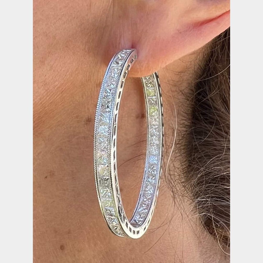 18K White Gold 12.76 Ct Diamond Hoop Earrings: 18K White Gold 12.76 Ct Diamond Hoop Earrings Elevate your style with these stunning 18K White Gold Channel Set Diamond Hoop Earrings. Weighing 20.7 grams, these earrings feature an impressive total o