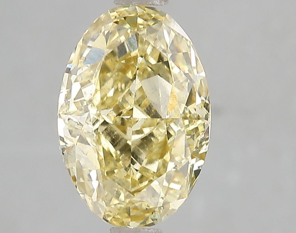 Loose Diamond - OVAL 3.08ct Fancy Intense Yellow SI1: Loose Diamond - OVAL 3.08ct Fancy Intense Yellow SI1 Source: This is a real non-mined Diamond that has been grown in a lab Shape: OVAL Carats: 3.08 Color: Fancy Intense Yellow Certification: IGI Video