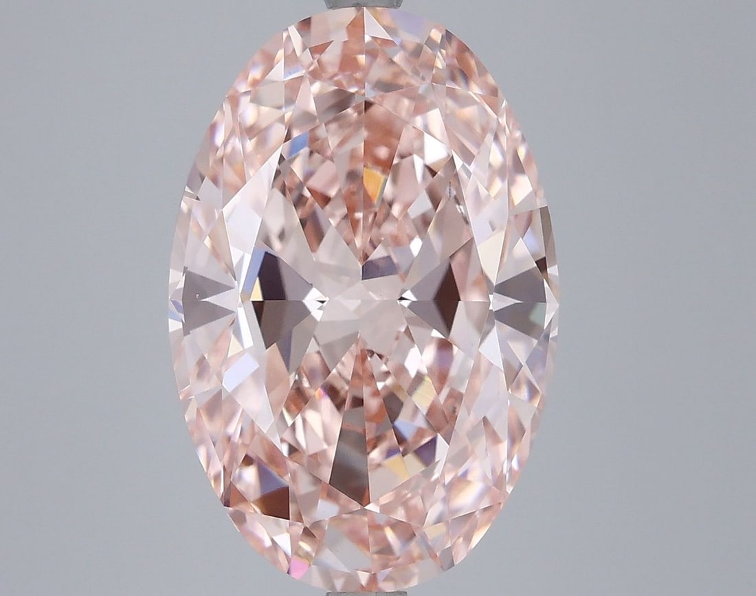 Loose Diamond - OVAL 6.84ct Fancy Vivid Pink VS1: Loose Diamond - OVAL 6.84ct Fancy Vivid Pink VS1 Source: This is a real non-mined Diamond that has been grown in a lab Shape: OVAL Carats: 6.84 Color: Fancy Vivid Pink Certification: IGI Video: