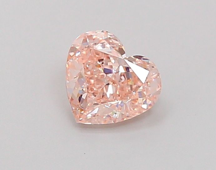 Loose Diamond - HEART 0.81ct Fancy Vivid Pink VVS2: Loose Diamond - HEART 0.81ct Fancy Vivid Pink VVS2 Source: This is a real non-mined Diamond that has been grown in a lab Shape: HEART Carats: 0.81 Color: Fancy Vivid Pink Certification: NONE Video:
