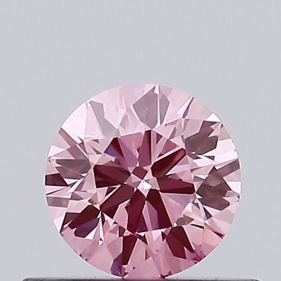 Loose Diamond - ROUND 0.38ct Fancy Vivid Pink VVS1: Loose Diamond - ROUND 0.38ct Fancy Vivid Pink VVS1 Source: This is a real non-mined Diamond that has been grown in a lab Shape: ROUND Carats: 0.38 Color: Fancy Vivid Pink Certification: IGI Video: