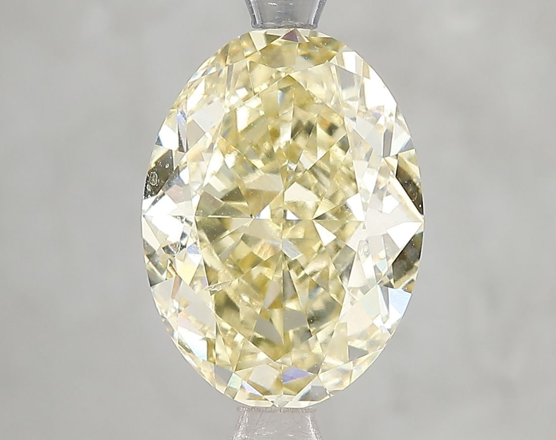 Loose Diamond - OVAL 5.0ct Fancy Intense Yellow VS2: Loose Diamond - OVAL 5.0ct Fancy Intense Yellow VS2 Source: This is a real non-mined Diamond that has been grown in a lab Shape: OVAL Carats: 5.0 Color: Fancy Intense Yellow Certification: IGI Video: