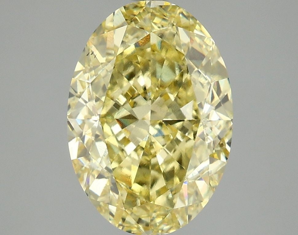 Loose Diamond - OVAL 4.02ct Fancy Vivid Yellow VS2: Loose Diamond - OVAL 4.02ct Fancy Vivid Yellow VS2 Source: This is a real non-mined Diamond that has been grown in a lab Shape: OVAL Carats: 4.02 Color: Fancy Vivid Yellow Certification: IGI Video: