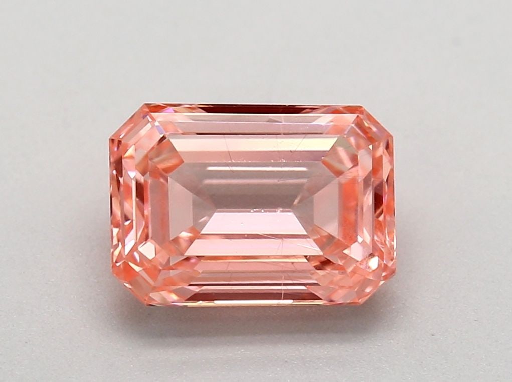 Loose Diamond - EMERALD 0.91ct Fancy Intense Orange Pink SI1: Loose Diamond - EMERALD 0.91ct Fancy Intense Orange Pink SI1 Source: This is a real non-mined Diamond that has been grown in a lab Shape: EMERALD Carats: 0.91 Color: Fancy Intense Orange Pink Certific