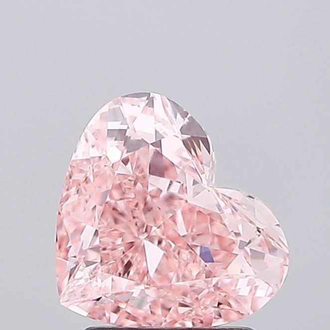 Loose Diamond - HEART 1.94ct Fancy Vivid Pink VS1: Loose Diamond - HEART 1.94ct Fancy Vivid Pink VS1 Source: This is a real non-mined Diamond that has been grown in a lab Shape: HEART Carats: 1.94 Color: Fancy Vivid Pink Certification: IGI Video: