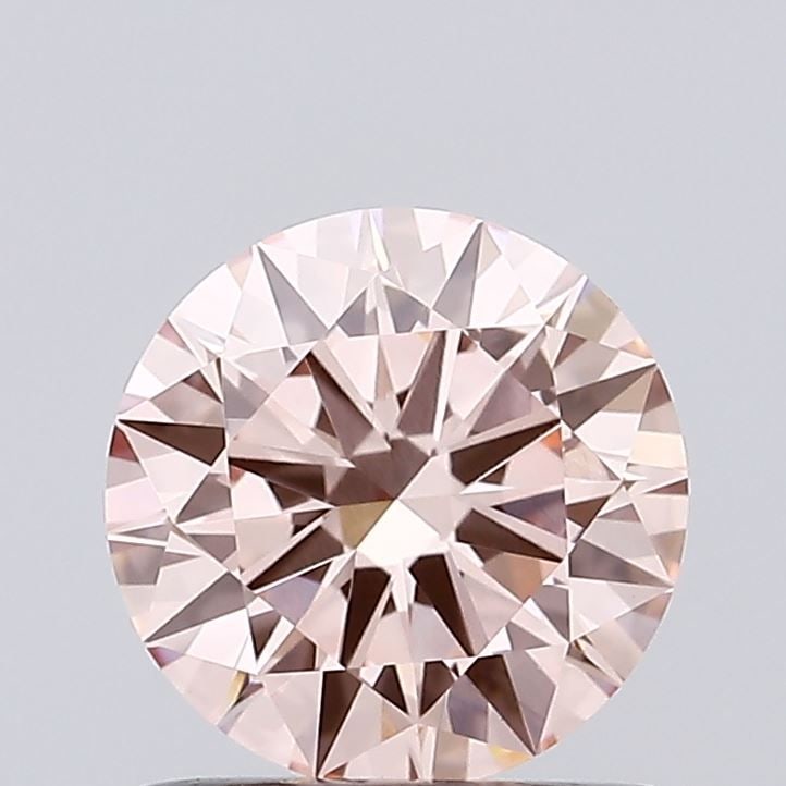 Loose Diamond - ROUND 0.97ct Fancy Vivid Pink VVS2: Loose Diamond - ROUND 0.97ct Fancy Vivid Pink VVS2 Source: This is a real non-mined Diamond that has been grown in a lab Shape: ROUND Carats: 0.97 Color: Fancy Vivid Pink Certification: IGI Video: