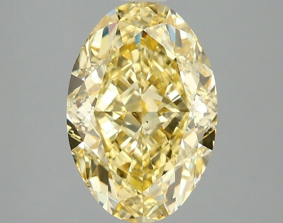 Loose Diamond - OVAL 3.07ct Fancy Vivid Yellow VS1: Loose Diamond - OVAL 3.07ct Fancy Vivid Yellow VS1 Source: This is a real non-mined Diamond that has been grown in a lab Shape: OVAL Carats: 3.07 Color: Fancy Vivid Yellow Certification: IGI Video: