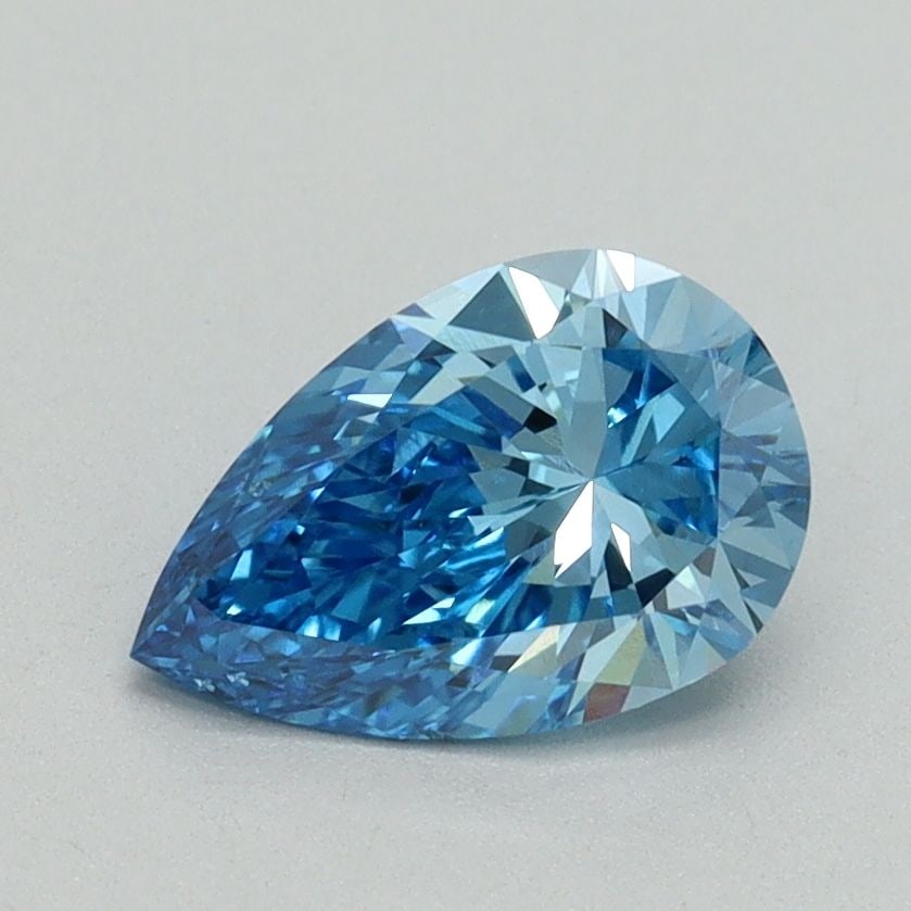 Loose Diamond - PEAR 1.0ct Fancy Vivid Blue VS2: Loose Diamond - PEAR 1.0ct Fancy Vivid Blue VS2 Source: This is a real non-mined Diamond that has been grown in a lab Shape: PEAR Carats: 1.0 Color: Fancy Vivid Blue Certification: IGI Video:
