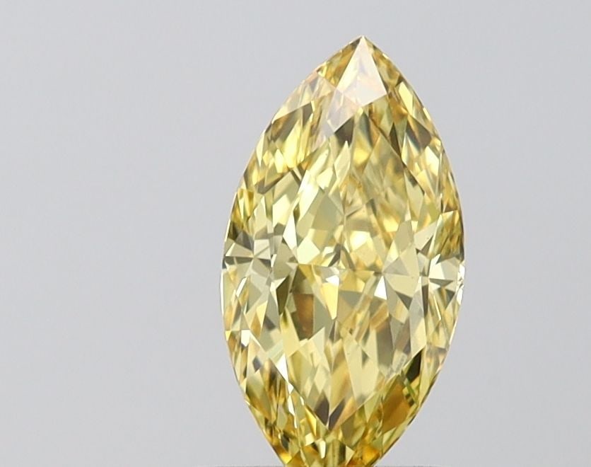 Loose Diamond - MARQUISE 1.0ct Fancy Vivid Yellow VS1: Loose Diamond - MARQUISE 1.0ct Fancy Vivid Yellow VS1 Source: This is a real non-mined Diamond that has been grown in a lab Shape: MARQUISE Carats: 1.0 Color: Fancy Vivid Yellow Certification: IGI Vid